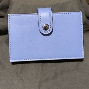 Coach accordion leather card case.